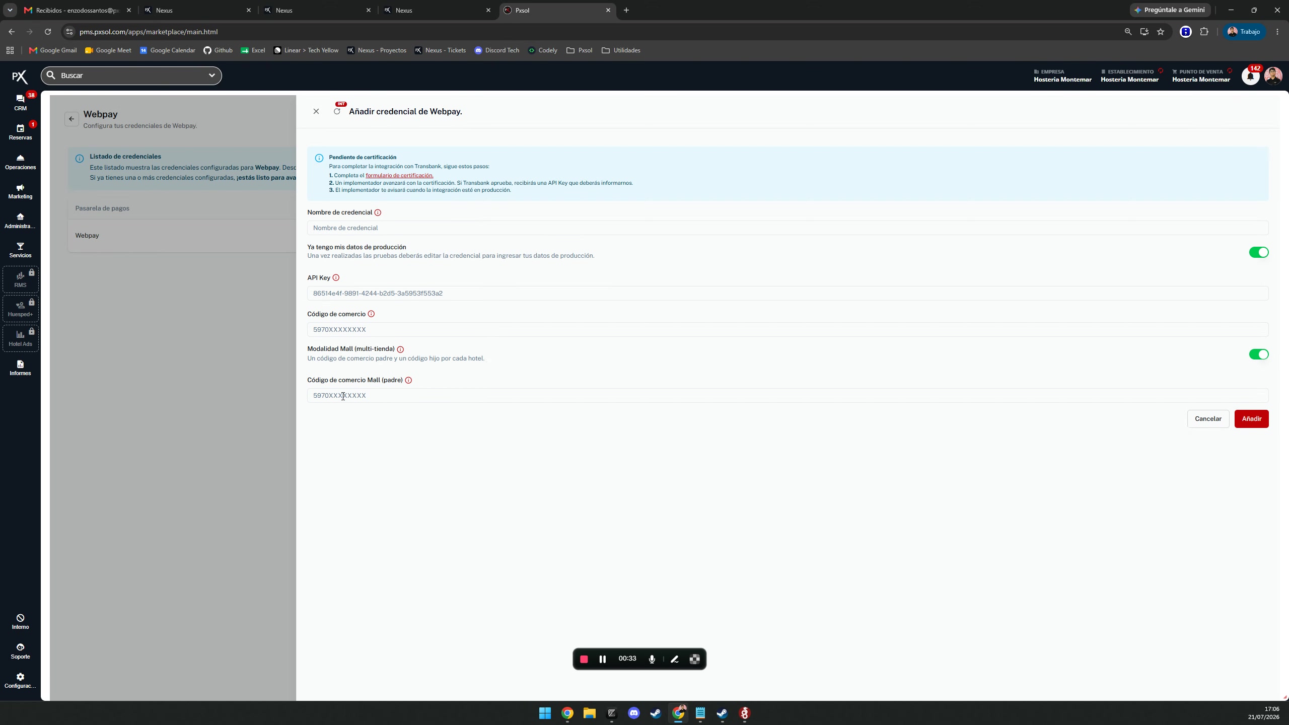 Formulario de credenciales con los campos para el código de comercio principal y el código de la tienda hija visibles.